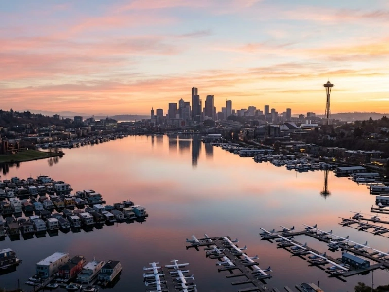 Aerial sunset view of Seattle skyline and Space Needle over Lake Union representing catch up bookkeeping Seattle King County service area