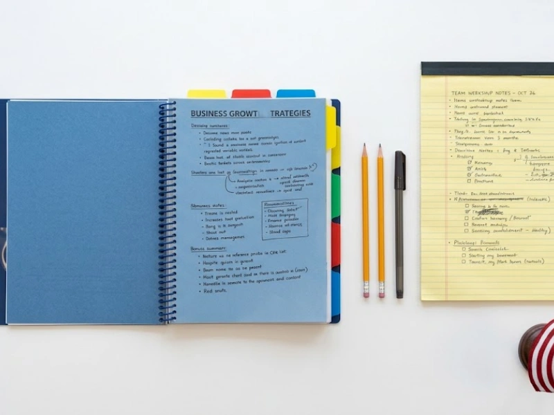 Business growth notebook and team workshop notes for QuickBooks Online setup and cleanup training